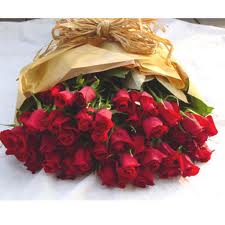 12 red roses in a bouquet